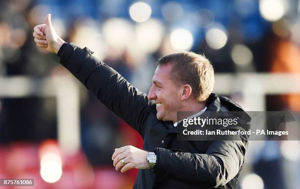 Celtic manager Brendan Rodgers salutes the Celtic fans after the Ladbrokes Scottish Premiership match at the Global Energy Stadium, Dingwall.