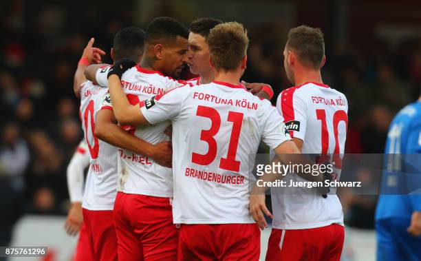 Daniel Keita-Ruel of Cologne is hugged by team mates after scoring during the 3. Liga match between SC Fortuna Koeln and 1. FC Magdeburg at...