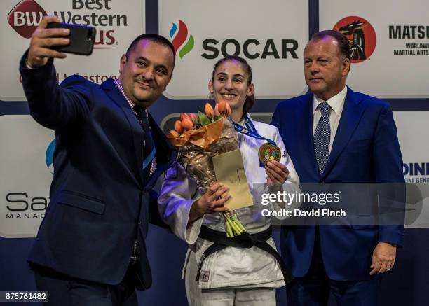 Kosovo's judo coach, Driton Kuka takes a 'selfie' picture of Kosovo's u57kg gold medalist Nora Gjakova together with the International Judo...