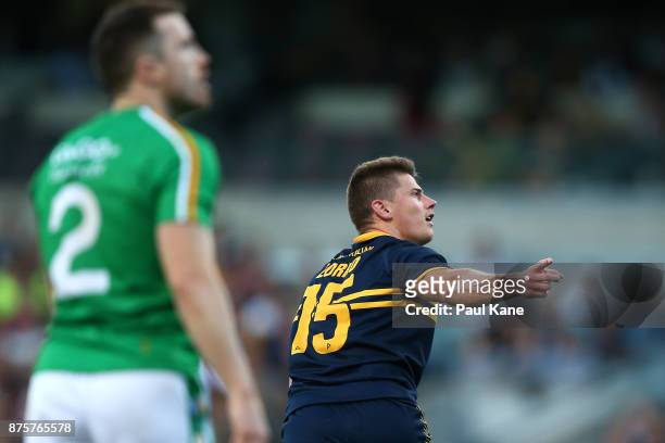 Dayne Zorko of Australia celebrates an over during game two of the International Rules Series between Australia and Ireland at Domain Stadium on...