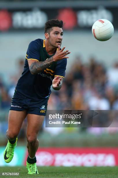 Chad Wingard of Australia hand passes during game two of the International Rules Series between Australia and Ireland at Domain Stadium on November...