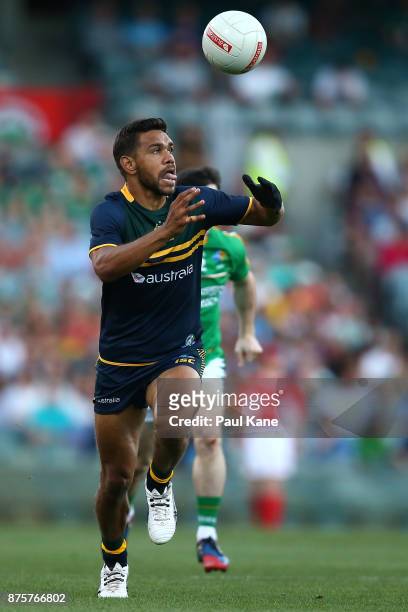 Neville Jetta of Australia controls the ball during game two of the International Rules Series between Australia and Ireland at Domain Stadium on...