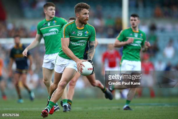 Zach Tuohy of Ireland looks to pass the ball during game two of the International Rules Series between Australia and Ireland at Domain Stadium on...