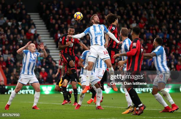 Callum Wilson of AFC Bournemouth heads the ball to score the opening goal during the Premier League match between AFC Bournemouth and Huddersfield...