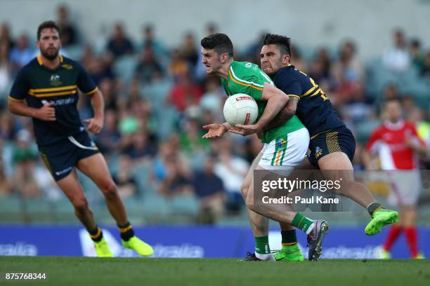 Chad Wingard of Australia tackles Brendan Harrison of Ireland during game two of the International Rules Series between Australia and Ireland at...