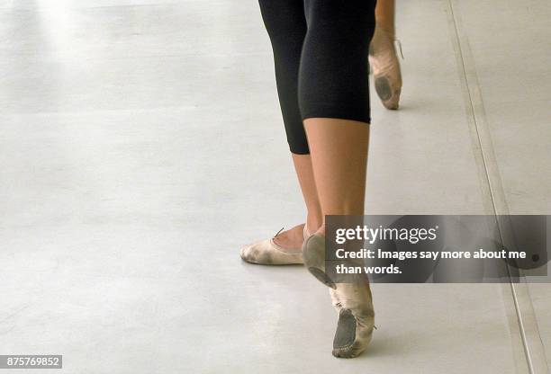 dancers feet in old dirty sneakers rehearsing. - ballet feet hurt stock pictures, royalty-free photos & images