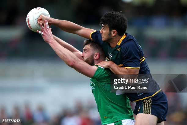Robbie Tarrant of Australia spoils the mark for Aidan O'Shea of Ireland during game two of the International Rules Series between Australia and...