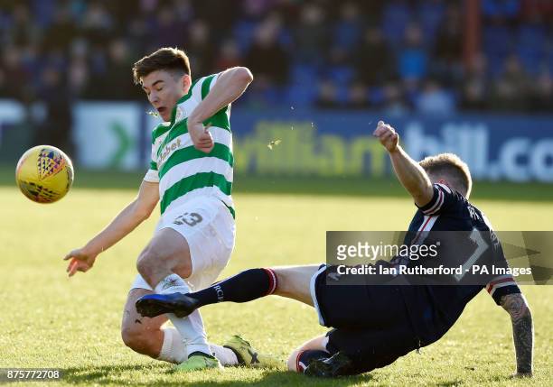 Celtic's Kieran Tierney tackles Ross County's Michael Garden resulting in a yellow card during the Ladbrokes Scottish Premiership match at the Global...