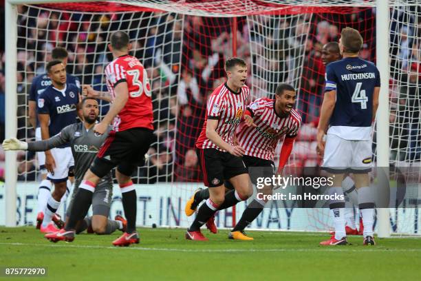 Sunderland players celebrate with Lewis Grabban after he scores the first goal during the Sky Bet Championship match between Sunderland and Millwall...