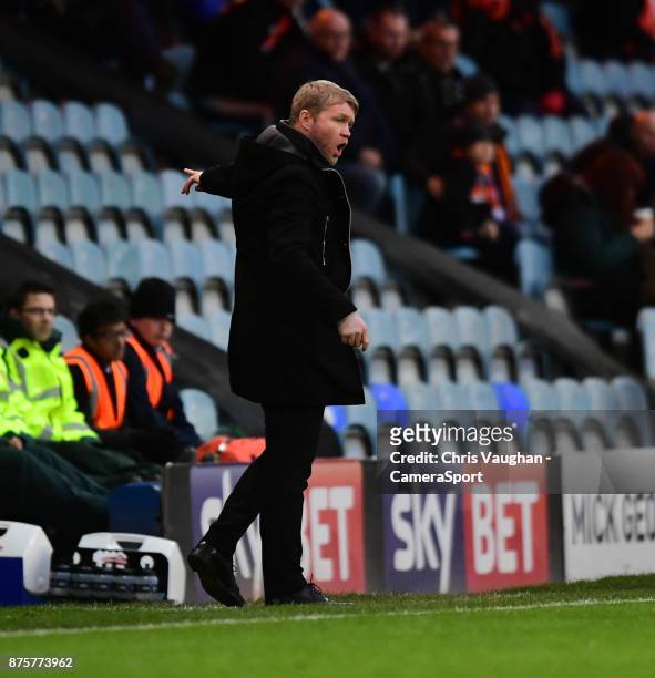 Peterborough United manager Grant McCann shouts instructions to his team from the technical area during the Sky Bet League One match between...