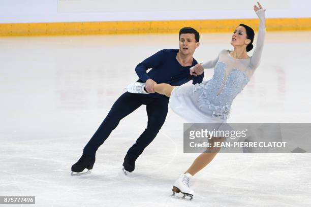 Italy's Charlene Guignard and Marco Fabbri perform during the Ice Dance Free Dance during the Internationaux de France ISU Grand Prix of Figure...