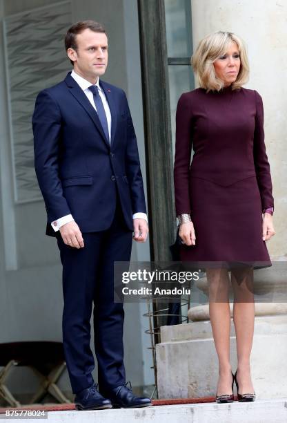 French President Emmanuel Macron and his wife Brigitte accompany Lebanese Prime Minister Saad Hariri at the Elysee Palace in Paris, France on...