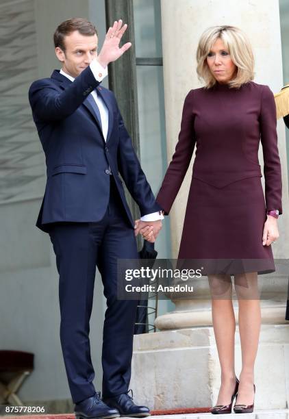 French President Emmanuel Macron and his wife Brigitte accompany Lebanese Prime Minister Saad Hariri at the Elysee Palace in Paris, France on...