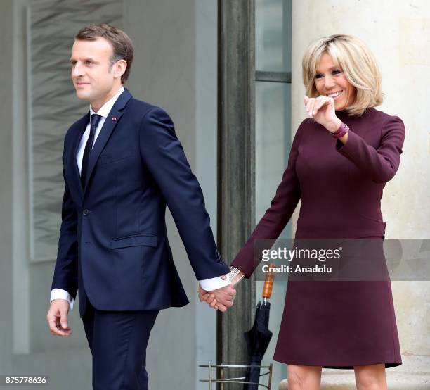 French President Emmanuel Macron and his wife Brigitte accompany Lebanese Prime Minister Saad Hariri at the Elysee Palace in Paris, France on...