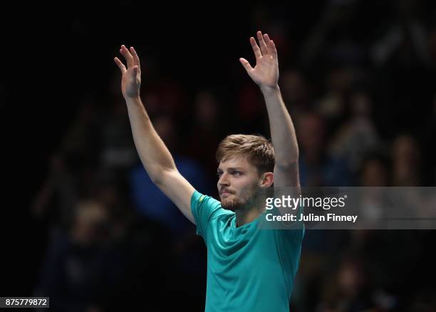 David Goffin of Belgium celebrates defeating Roger Federer of Switzerland in the semi finals during day seven of the Nitto ATP World Tour Finals...
