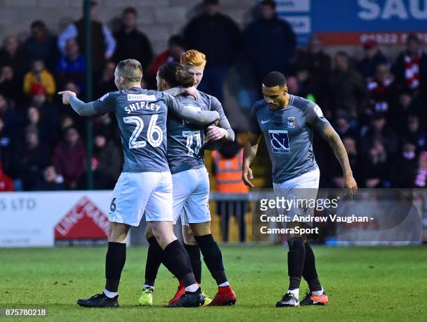 Coventry City's Jodi Jones, second in from left, celebrates scoring his sides equalising goal to make the score 1-1 during the Sky Bet League Two...