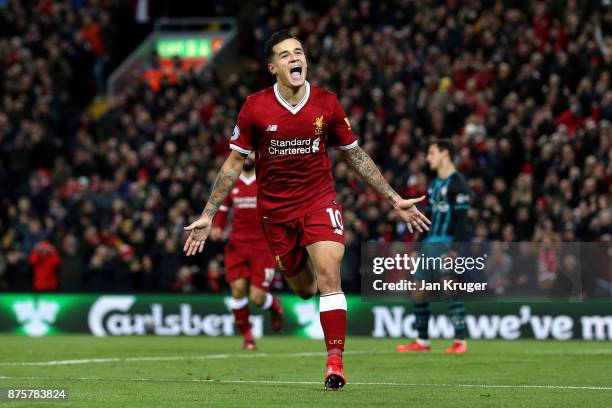 Philippe Coutinho of Liverpool celebrates scoring his side's third goal during the Premier League match between Liverpool and Southampton at Anfield...