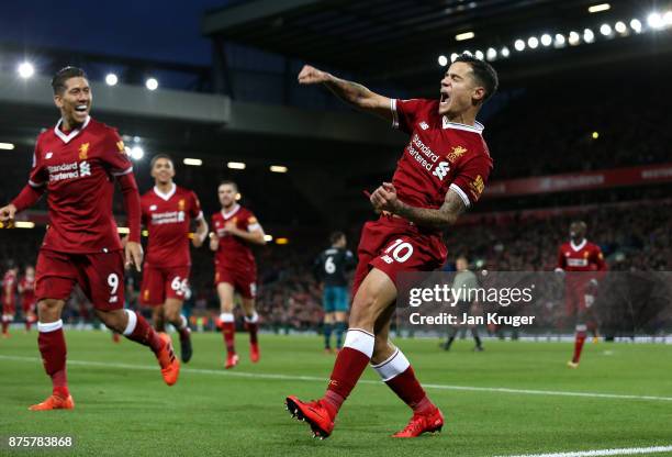 Philippe Coutinho of Liverpool celebrates scoring his side's third goal during the Premier League match between Liverpool and Southampton at Anfield...