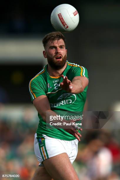 Aidan O'Shea of Ireland hand passes the ball during game two of the International Rules Series between Australia and Ireland at Domain Stadium on...