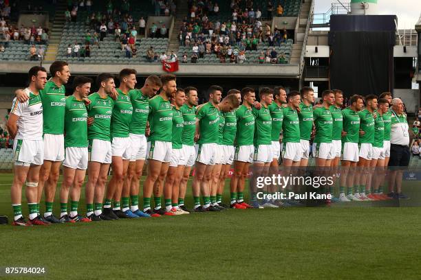 The Irish team line up for the national anthems during game two of the International Rules Series between Australia and Ireland at Domain Stadium on...