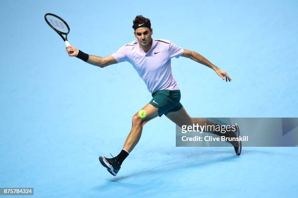 Roger Federer of Switzerland plays a forehand during his three set defeat by David Goffin of Belgium in their semi final match the Nitto ATP World...