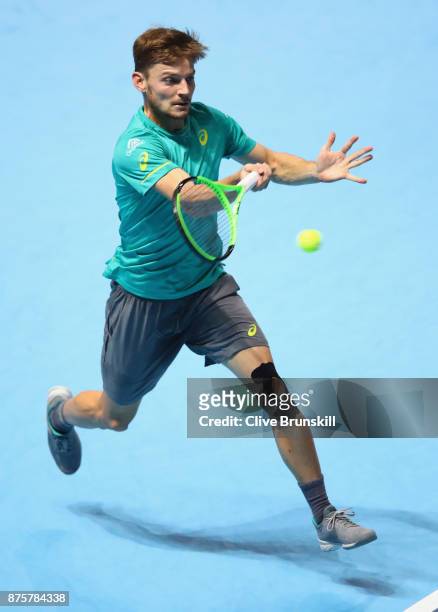 David Goffin of Belgium plays a forehand during his three set victory against Roger Federer of Switzerland in their semi final match the Nitto ATP...