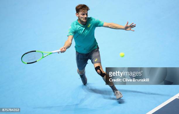 David Goffin of Belgium plays a forehand during his three set victory against Roger Federer of Switzerland in their semi final match the Nitto ATP...