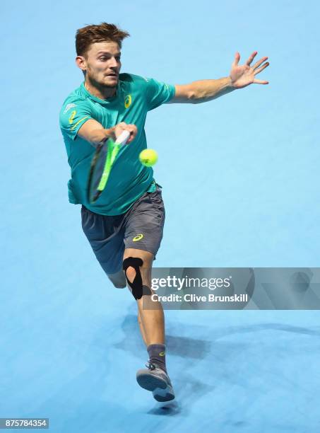 David Goffin of Belgium plays a forehand during his three set victory against Roger Federer of Switzerland in their semi final match the Nitto ATP...