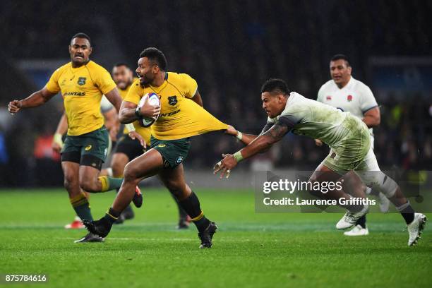 Samu Kerevi of Australia attempts to challenged by Nathan Hughes of England during the Old Mutual Wealth Series match between England and Australia...