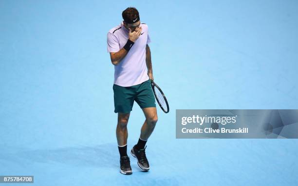 Roger Federer of Switzerland shows his dejection during his three set defeat by David Goffin of Belgium in their semi final match the Nitto ATP World...