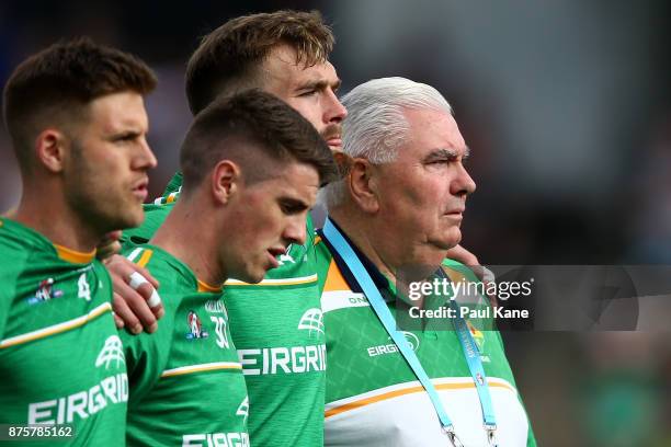 Joe Kernan, coach of Ireland looks on as the national anthems are sung during game two of the International Rules Series between Australia and...