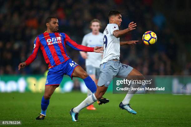 Dominic Calvert-Lewin of Everton and Jason Puncheon of Crystal Palace compete for the ball during the Premier League match between Crystal Palace and...