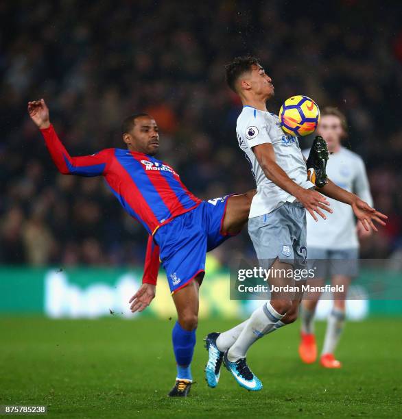 Dominic Calvert-Lewin of Everton and Jason Puncheon of Crystal Palace compete for the ball during the Premier League match between Crystal Palace and...