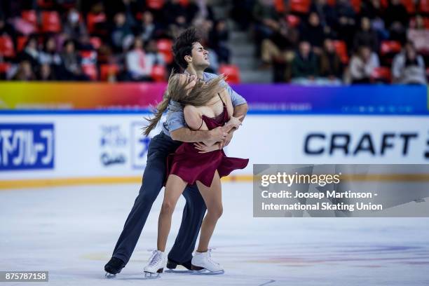 Kaitlyn Weaver and Andrew Poje of Canada compete in the Ice Dance Free Dance during day two of the ISU Grand Prix of Figure Skating at Polesud Ice...