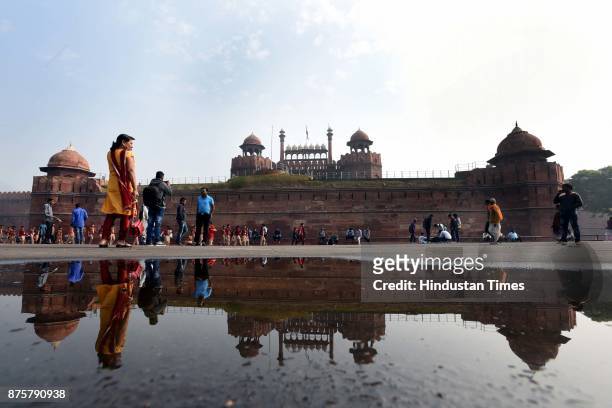 Tourists enjoy a clean weather morning, on November 18, 2017 in New Delhi, India. The air was at its cleanest in a month and people in Delhi-NCR woke...