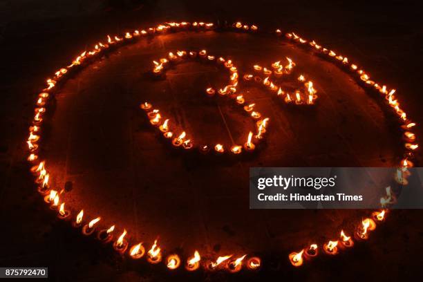 Devotees of Kerala community lightning 3500 Diyas on the occasion of start God Ayyappa Fast from Thursday at Ayyappa Temple Vartak Nager, Thane, on...