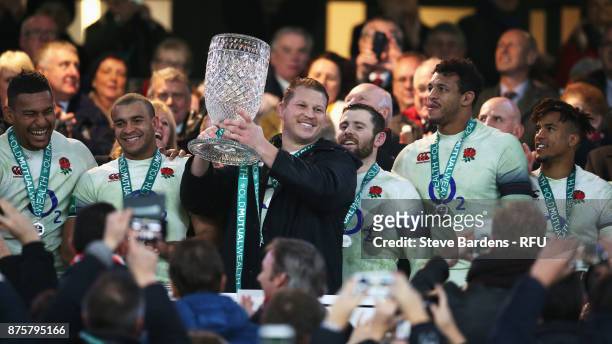 Dylan Hartley of England lifts the Cook Cup after victory in the Old Mutual Wealth Series match between England and Australia at Twickenham Stadium...
