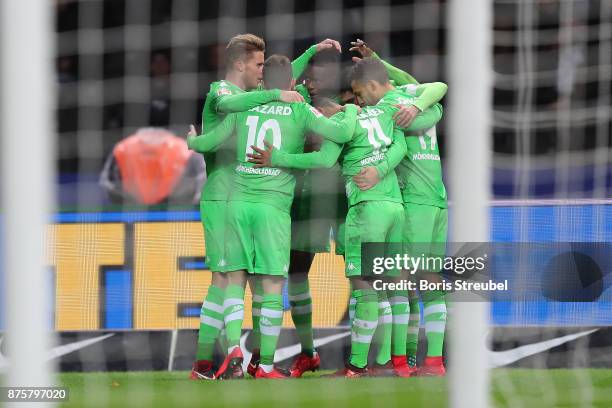 Lars Stindl of Moenchengladbach celebrates with his team mates after he scored to make it 0:1 during the Bundesliga match between Hertha BSC and...