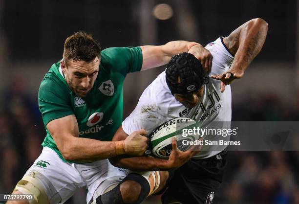 Dublin , Ireland - 18 November 2017; Akapusi Qera of Fiji is tackled by Jack Conan of Ireland during the Guinness Series International match between...