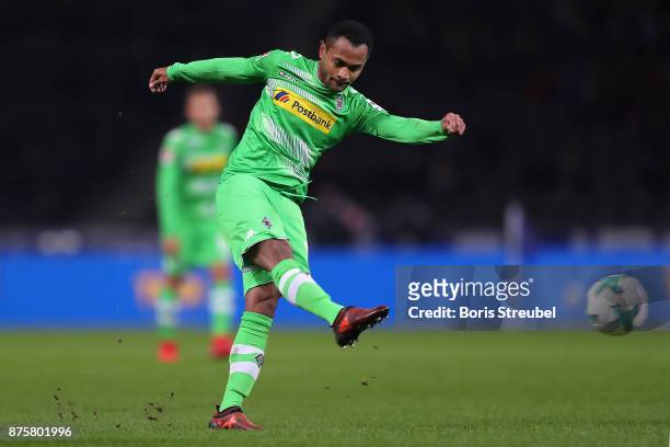 Raffael of Moenchengladbach shoots and scores a goal to make it 3:0 during the Bundesliga match between Hertha BSC and Borussia Moenchengladbach at...