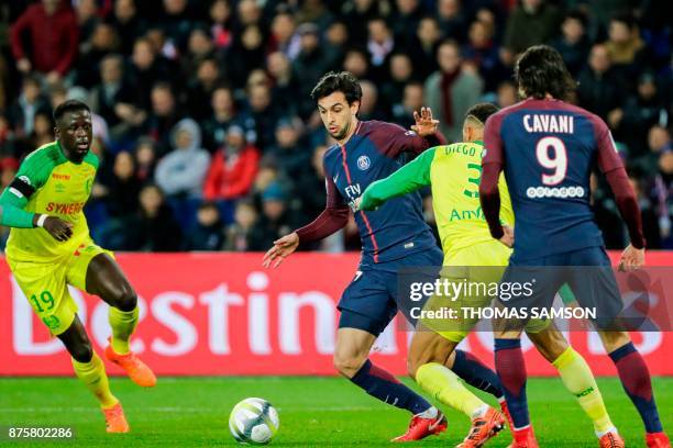 Paris Saint-Germain's Argentinian midfielder Javier Pastore dribbles Nantes' Brazilian defender Diego Carlos during the French L1 football match...