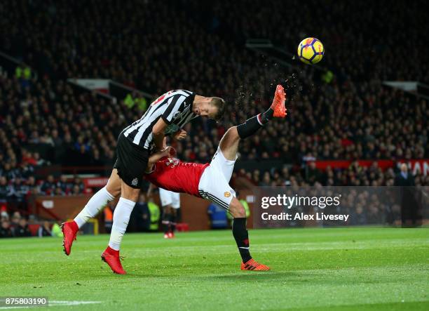 Florian Lejeune of Newcastle United and Juan Mata of Manchester United in action during the Premier League match between Manchester United and...