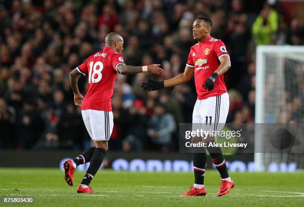 Anthony Martial of Manchester United and Ashley Young of Manchester United celebrates after Anthony Martial scores his sides first goal during the...