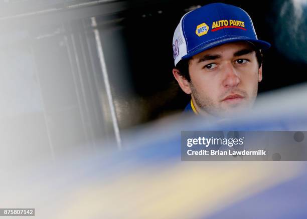 Chase Elliott, driver of the NAPA Chevrolet, stands in the garage area during practice for the Monster Energy NASCAR Cup Series Championship Ford...