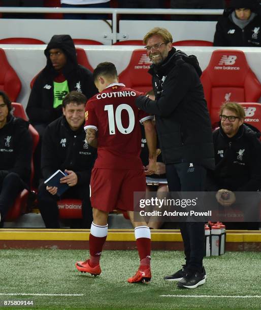 Jurgen Klopp manager of Liverpool with Philippe Coutinho during the Premier League match between Liverpool and Southampton at Anfield on November 18,...