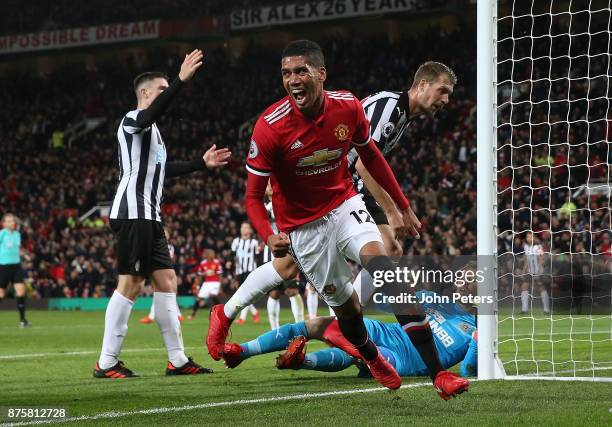 Chris Smalling of Manchester United celebrates scoring their second goal during the Premier League match between Manchester United and Newcastle...