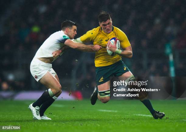 Australia's Sean McMahon is tackled by England's George Ford during the Old Mutual Wealth Series Autumn International match between England and...