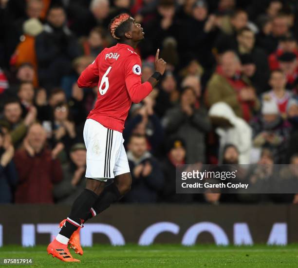 Paul Pogba of Manchester United celebrates scoring his sides third goal during the Premier League match between Manchester United and Newcastle...