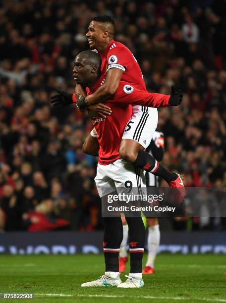 Romelu Lukaku of Manchester United celebrates with Antonio Valencia of Manchester United after scoring his sides fourth goal during the Premier...