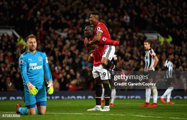 Romelu Lukaku of Manchester United celebrates with Antonio Valencia of Manchester United after scoring his sides fourth goal during the Premier...